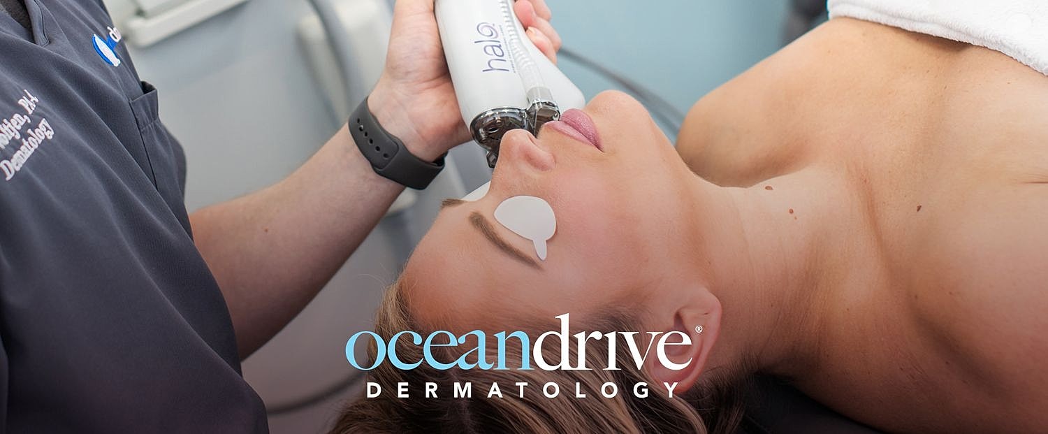 Dermatologist performing a skincare treatment on patient.