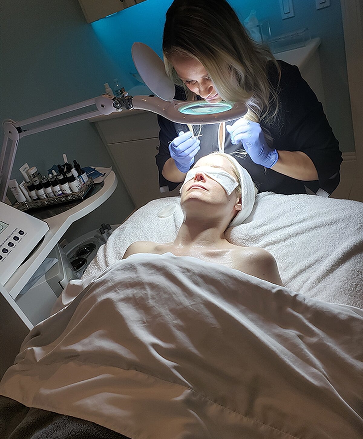 Smiling woman with long, light brown hair.