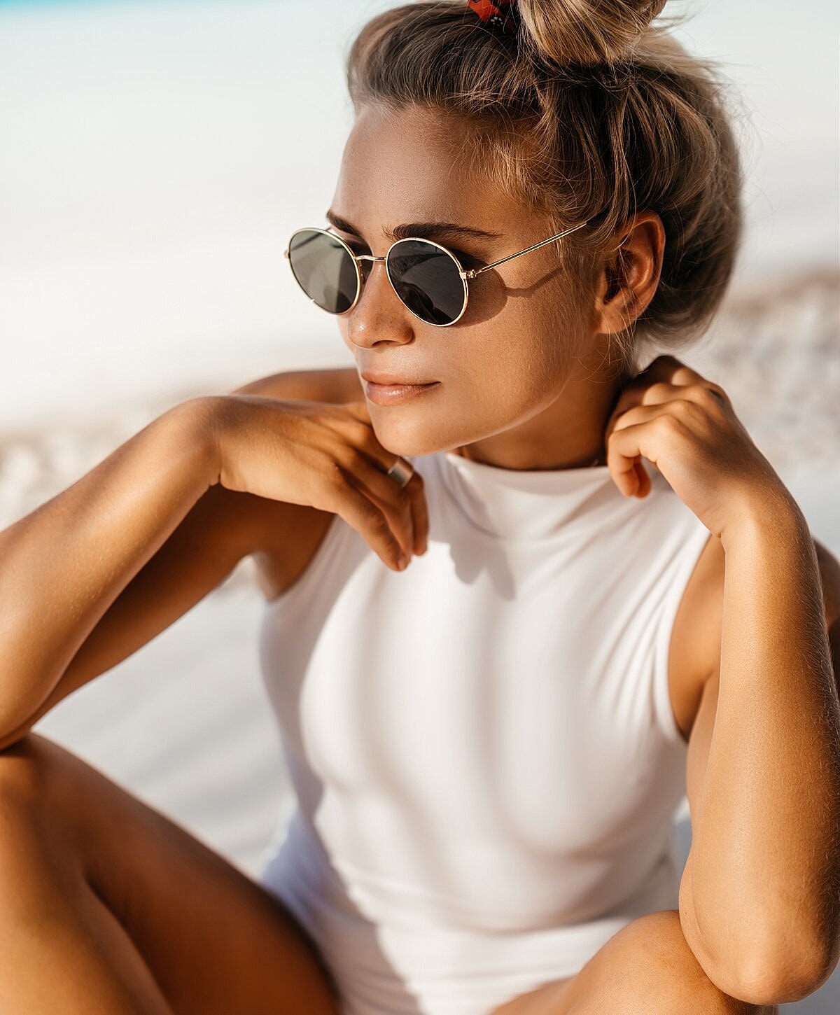 Smiling woman with long, light brown hair.