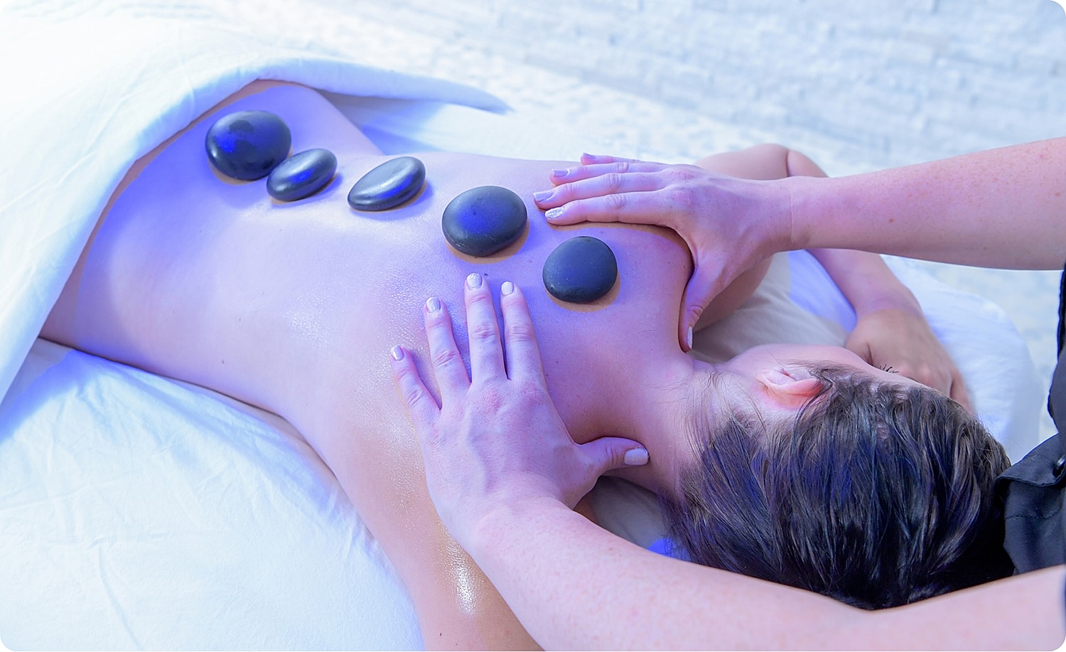 Modern relaxation space with refreshments and towels.